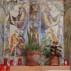 Ceramic panel of Our Lady of the Forsaken with saints