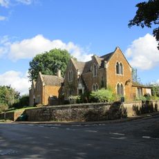 Pair Of Almshouses Linked By Low Wall