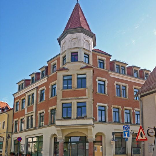 Mietshaus mit Ladenzone in Ecklage Hauptstraße 25