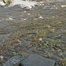 Raised Pavement At Entrance To Churchyard