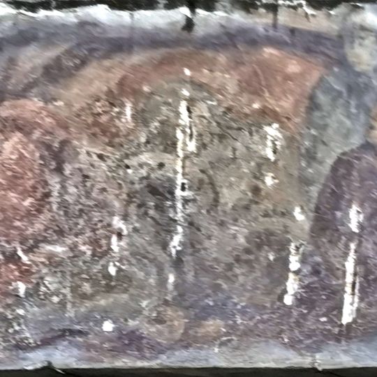 Quattro figure accovacciate