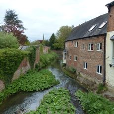 Lloyds Bank wall to north and south of garden