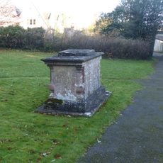 John Smith monument in the churchyard approximately 10 metres south east of chancel to Church of St John the Baptist