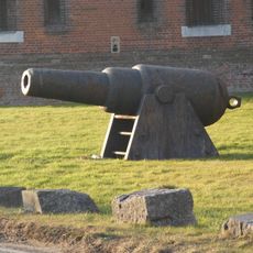 Gun Mounted On Wood Block In Front Of Fort Widley