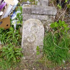 Milestone, Templer Way, 80m NE of entrance off Ashburton Road where tramway bed runs between houses to Pottery Road