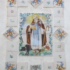 Cermic panel of Saint Anthony the Great at Nicolás Factor street