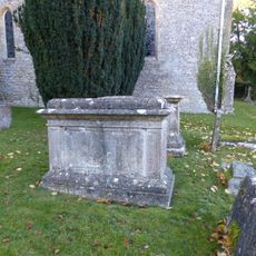 Group of 5 monuments in the churchyard approximately 6 metres south of chancel to Church of St John the Baptist