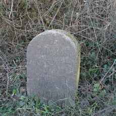 Milestone, Colley Lane; 450m NW of turn to Luton, 100m N of small Transco depot