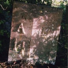 Milepost, 14m S of Meadows Farm entrance