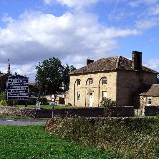 Thorpe Farmhouse and adjacent outbuildings