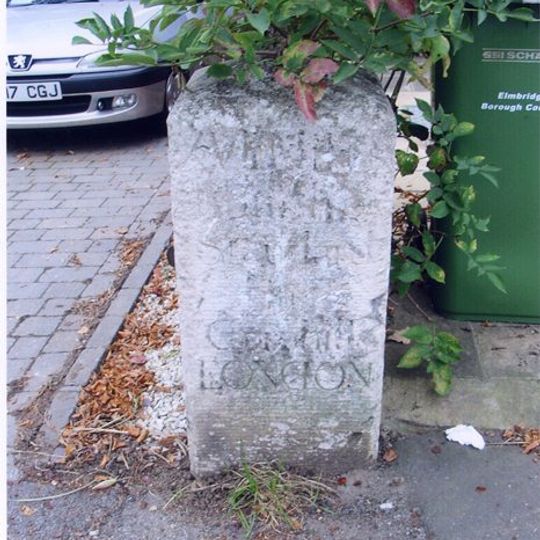 Milestone, Milbourne Lane, by Nos 24 & 26, E of Lynne Walk and Milbourne Lodge School