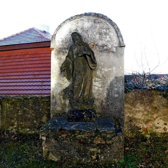 Socha svatého Františka z Assisi u kostela Povýšení svatého Kříže v Pyšelích
