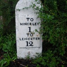Milestone, entrance to Milestone House, opp entrance to golf club