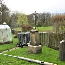 Kříž u domu 156 v Kunraticích u Cvikova