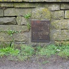 Plate To Milestone On Boundary Wall To School