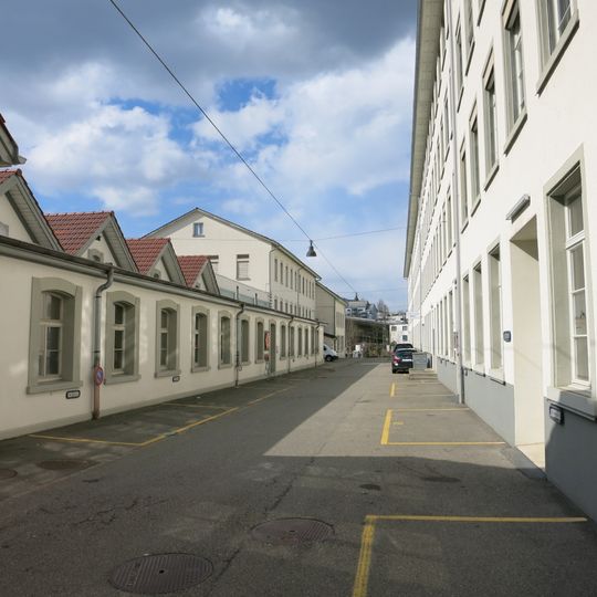 Ehemalige mechanisierte Seidenweberei mit MSA-Steg und Wohnsiedlung Sihlau