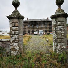 Gate piers and front garden walls to Calveley Hall