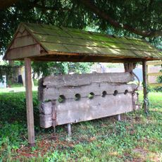 Stocks In Churchyard, About 22 Metres West Of West End, Church Of St Michael