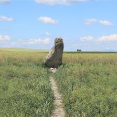 Menhir Zakletý mnich v poli severně od Drahomyšli