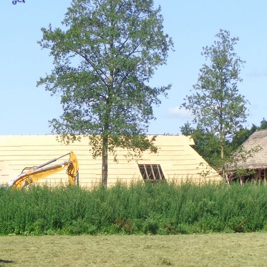 Boerderij van het dwarshuistype opgetrokken in machinale baksteen