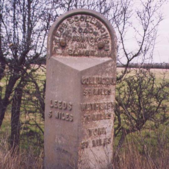 Milestone, Wetherby Road, N of Wellington Hill and traffic lights at Redhall Lane
