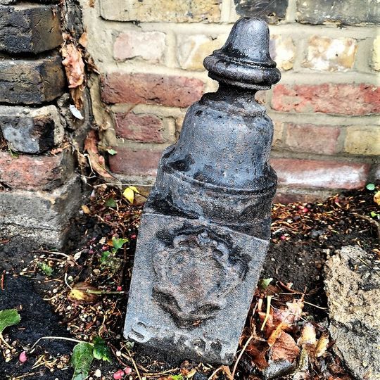 Boundary Marker Post On Roadside Pavement Adjacent To South West Corner Of Churchyard, Church Of St Mary The Virgin