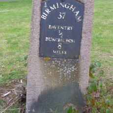 Milestone, 50m SE of A45 by-pass roundabout