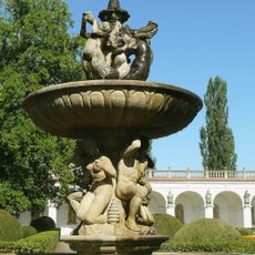 Tritons Fountain in Flower Garden
