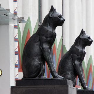 Carreras Cigarette Factory cat statues