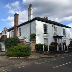 Gateway School With Railings And Wall