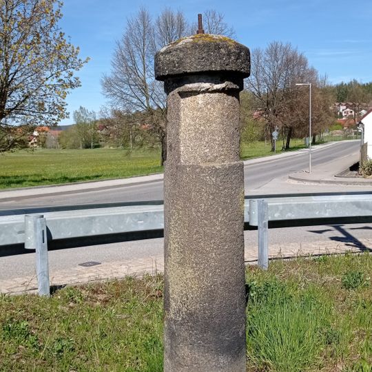 Stone signpost in Protivín