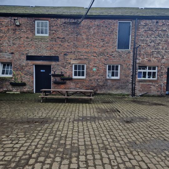 Row Of Cottages On East Side Of Stable Yard