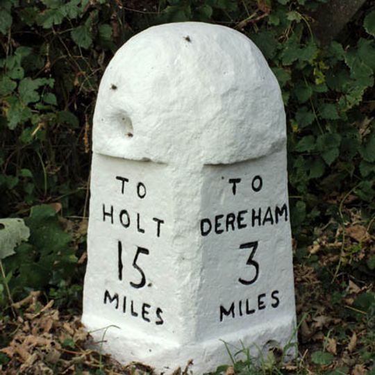 Milestone, opp. Gravel Pit House, S of juct