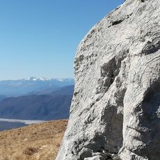 Face of a woman carved in the boulder