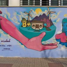 Mural que visibiliza uno de los objetivos de desarrollo sostenible: Ciudades Sostenibles. Constituyó la participación del artista en el II Concursode Arte Urbano: En movimiento por tu barrio 2022, donde obtuvo el tercer premio.