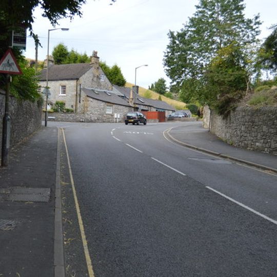 Roadside wall with gateways forming northern boundary to The Old Vicarage