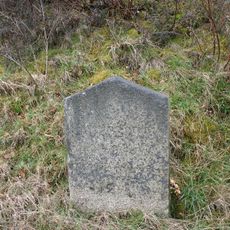 Milestone, Portgate, 50m E of Harris Arms PH