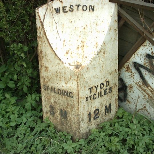 Milepost, by Bell Inn