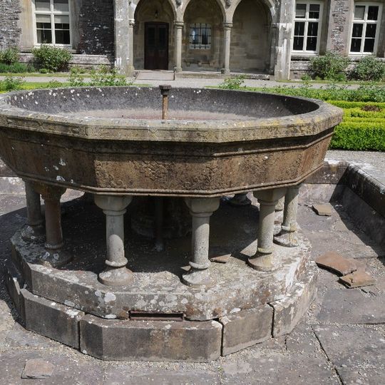 Fountain In centre of terraced garden on west side of Plas Dinefwr, Dynevor Park