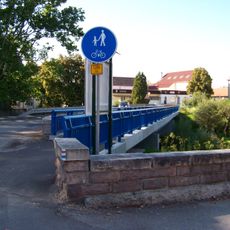 Lávka vedle mostu ulice Dr. E. Beneše přes Kozský potok v Sezimově Ústí