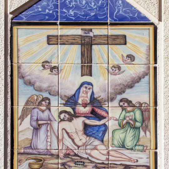 Retablo cerámico de la Virgen de los Dolores en calle Santa Rita