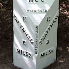 Milepost, S of N edge of New Wood
