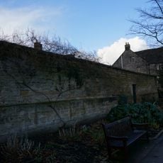 Wall on west side of Bath Gardens linking Rutland Buildings to Haig House