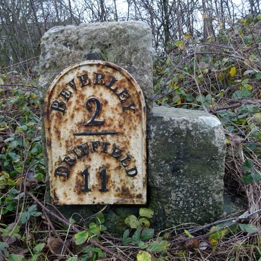 Milestone, N of entrance to Barracks