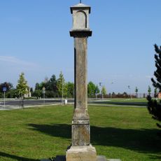 Plague column close to the Church of Assumption of Virgin Mary in Most