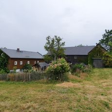 Wohnstallhaus und Scheune eines Dreiseithofes Am Belmsdorfer Berg 12