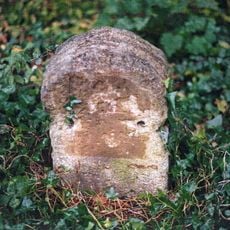 Milestone, SW of village, E end of Loxley Wood
