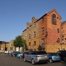Old Corner House And Attached Wall