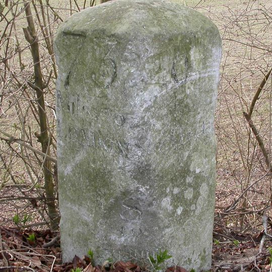 Milestone, Lopcombe Corner; 100m W Haynes Garage & caravan site