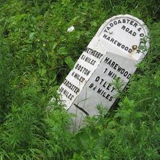 Milestone Opposite Entrance To New Laithe Farm